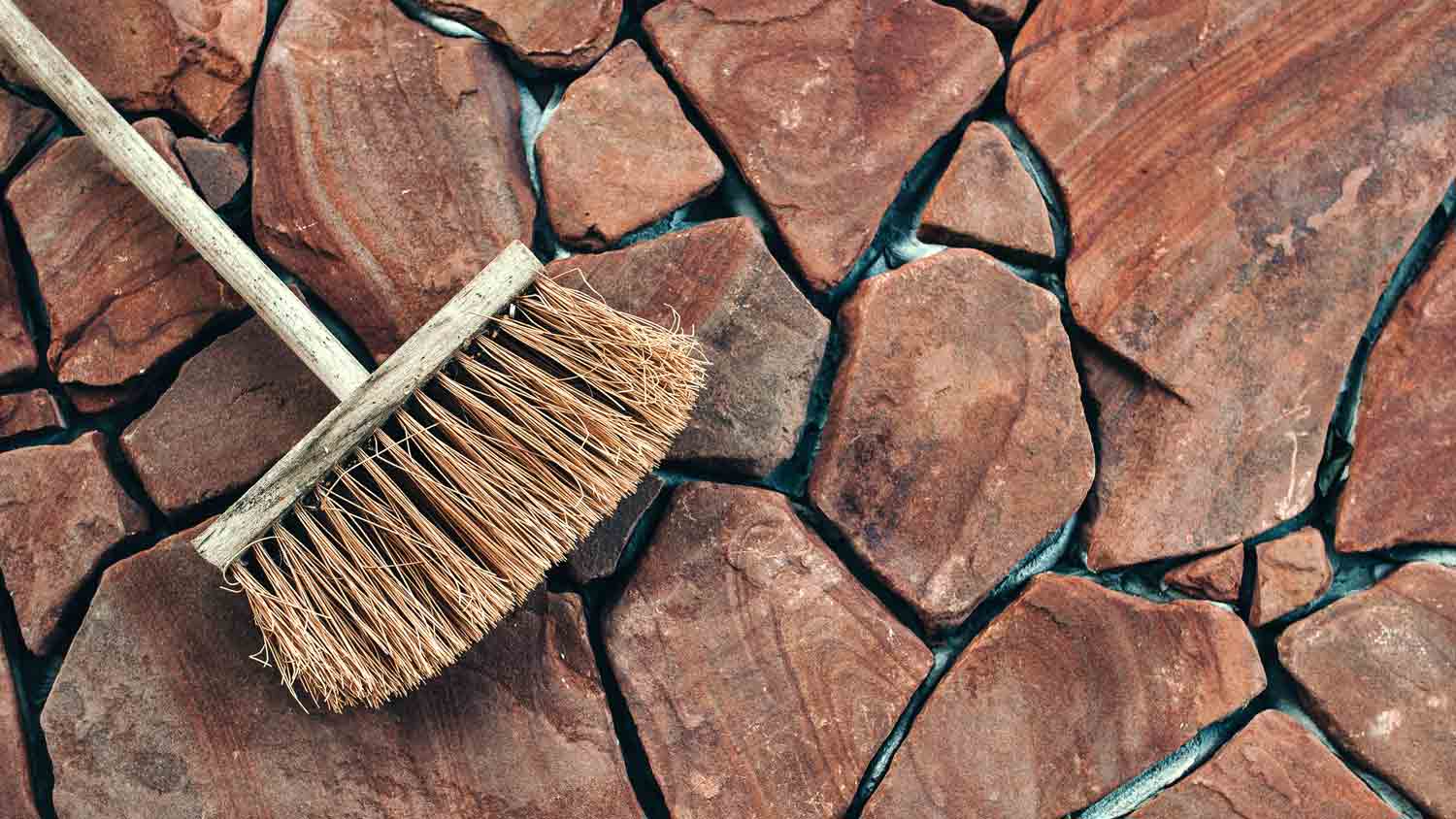 bristle brush on stamped concrete