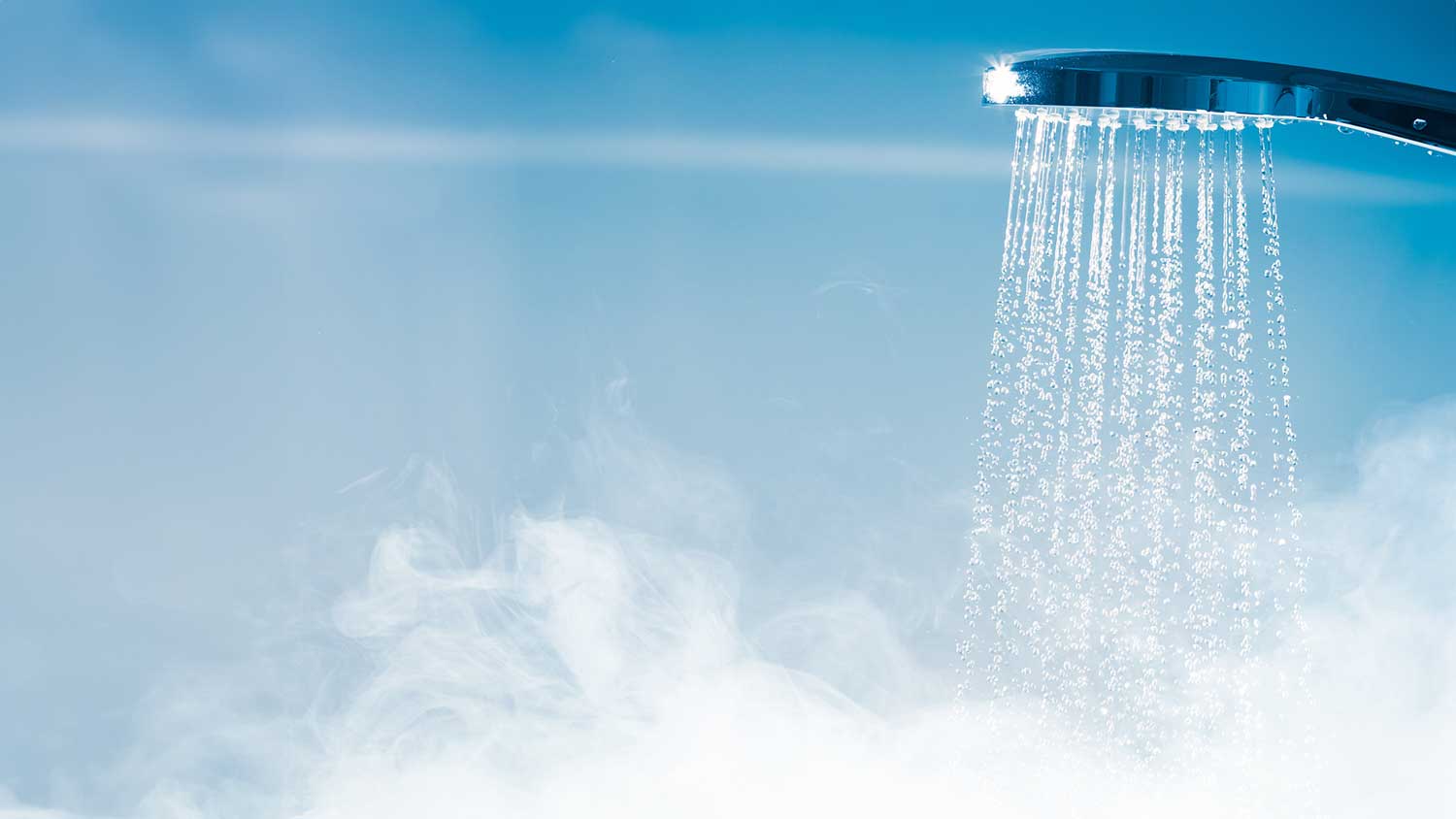 Steamy water coming out of a shower head