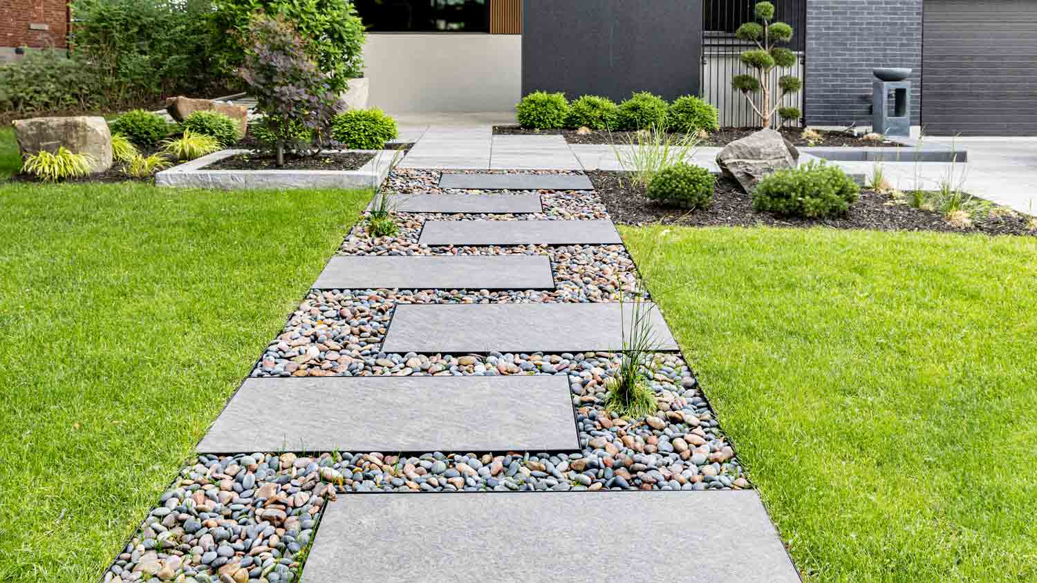 stone walkway to luxury home