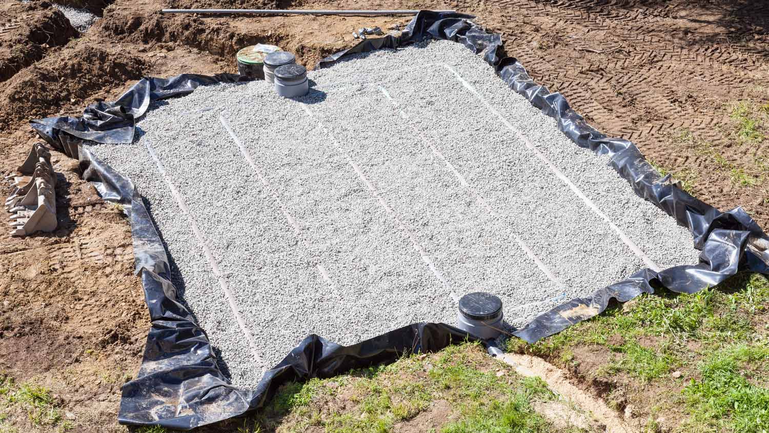 Aerial view of a new gravel filter bed for a septic tank 