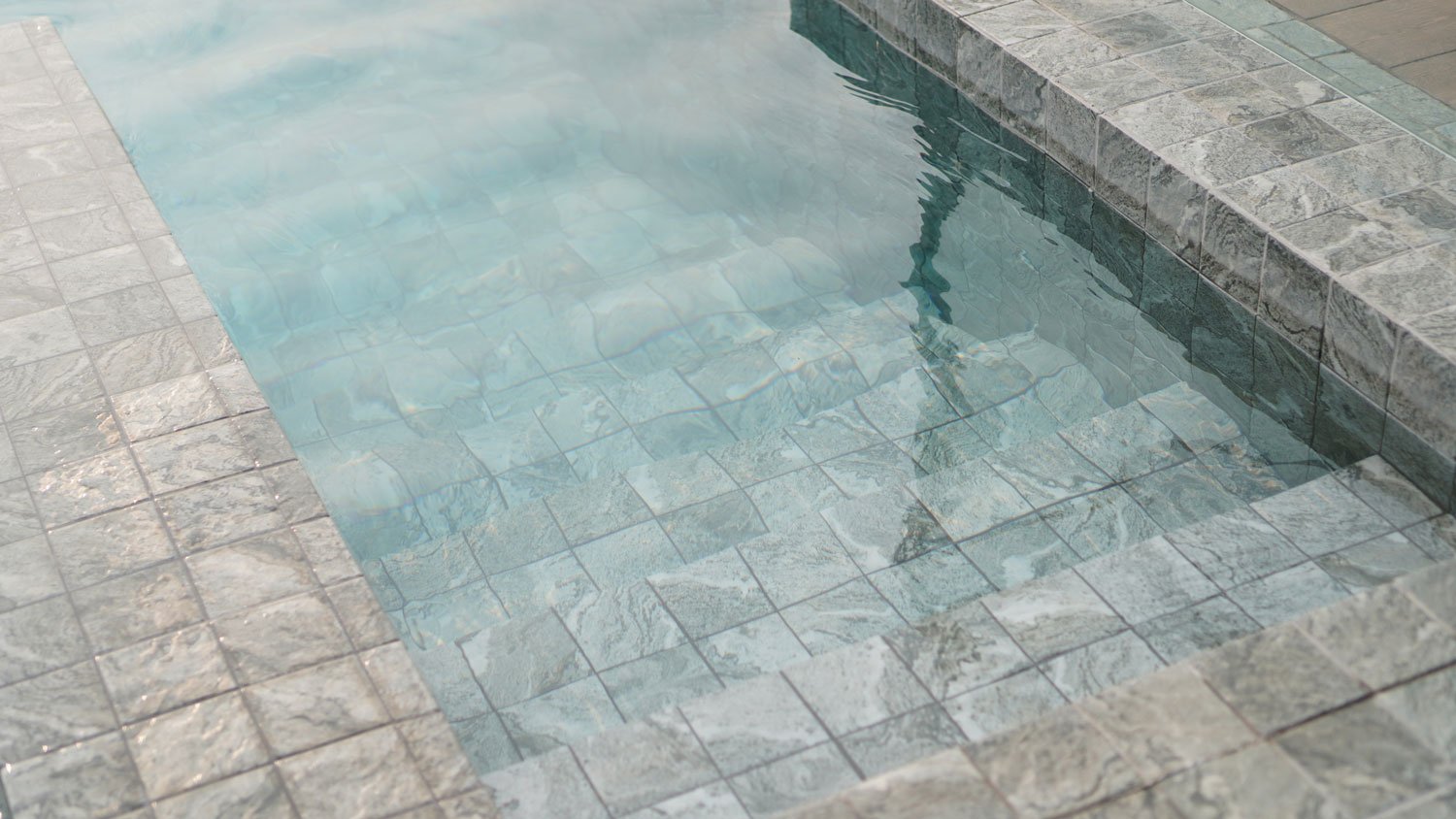 Swimming pool with stone details