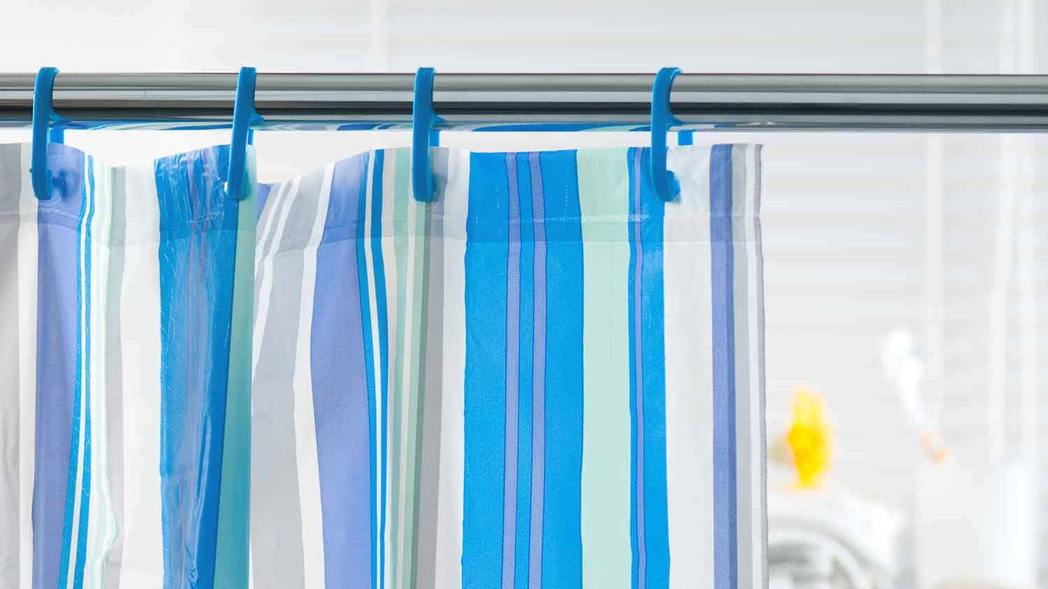 Blue and green striped shower curtain