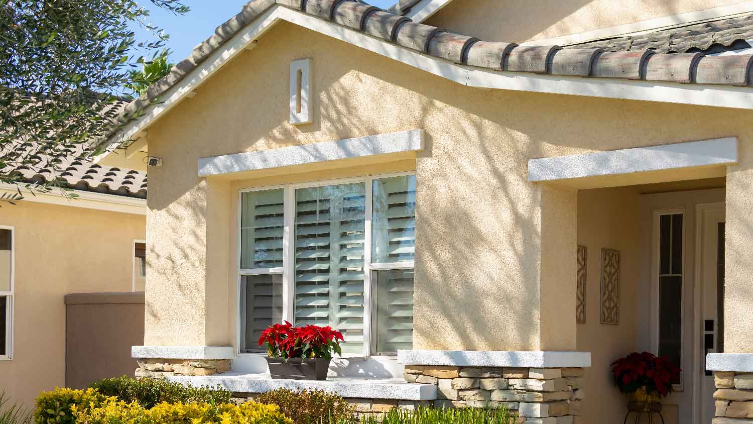 A stucco house on a sunny day