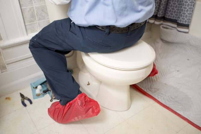 sitting on the toilet