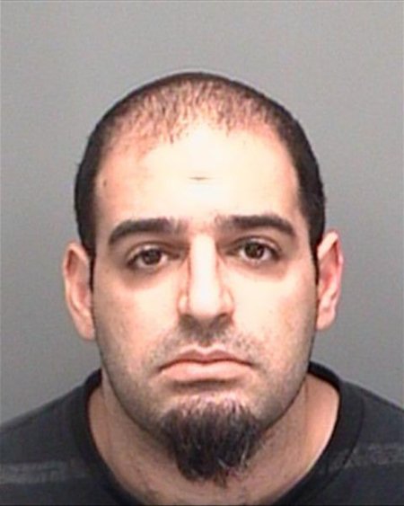 mugshot of Moshe Aharoni