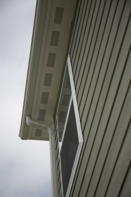 builder grade windows siding gutters for home construction (Photo by Eldon Lindsay)