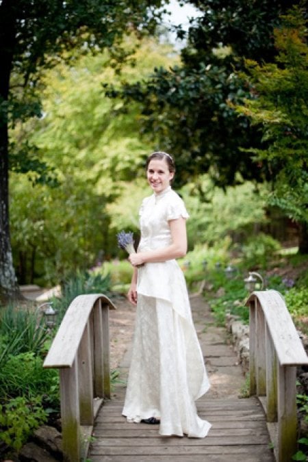 On her big day, Margaret’s daughter wore the heirloom wedding gown, complete with summer-appropriate short sleeves that still fit the original era of the dress. (Photo courtesy of Angie's List member Margaret B.)