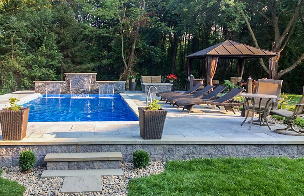 Pool with three fountains, seating and gazebo