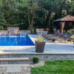 Pool with three fountains, seating and gazebo