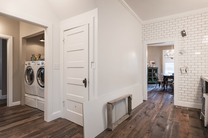 tile walls, reclaimed barn wood flooring