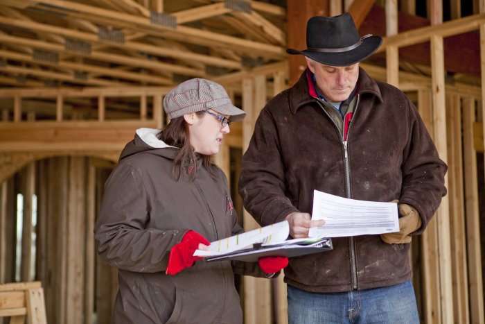 two people looking at home designs