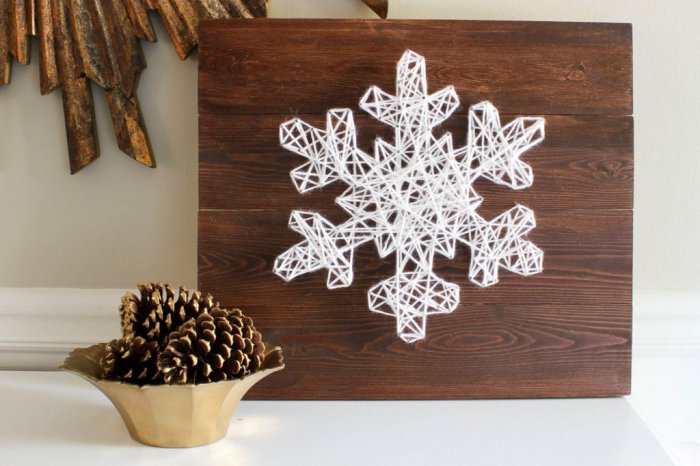 This DIY snowflake string art will look good throughout the winter. (Image courtesy of Erin Spain Blog)