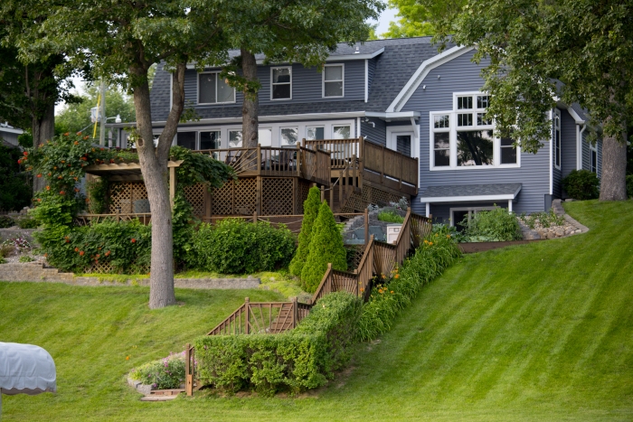 lakefront house with stairs to water