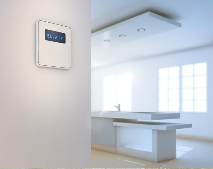 programmable thermostat on white wall