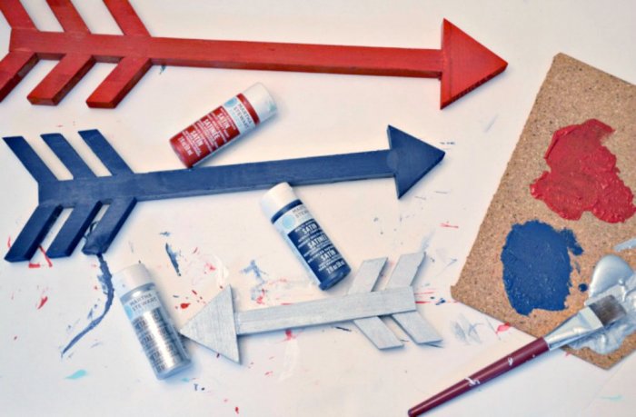 Transform the frame with some DIY wooden arrows. (Photo by Abbey DeHart)