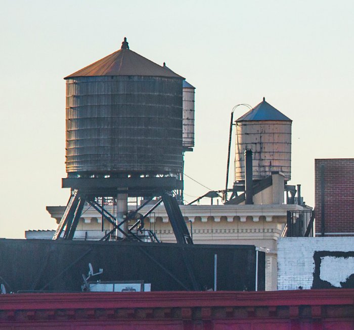 Wooden water towers atop buildings in New York City