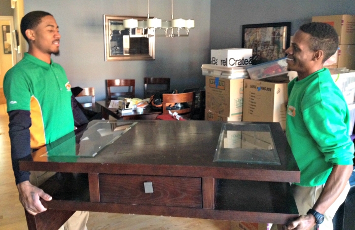Movers with College Hunks Hauling Junk say January usually offers customers more flexibility when choosing a moving date. (Jason Hargraves)