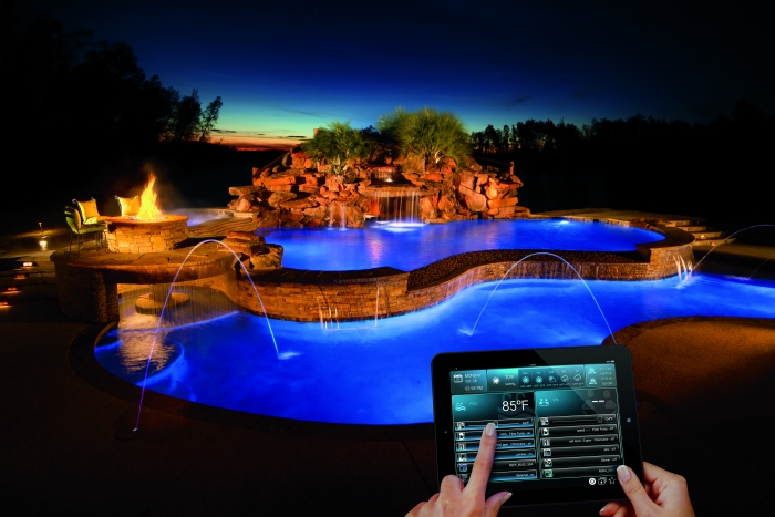 woman uses home automation panel to control swimming pool features
