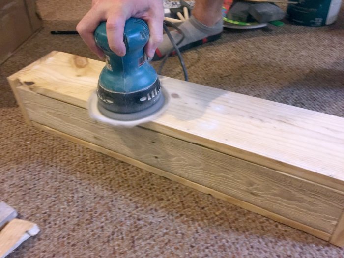 sanding DIY floating shelf