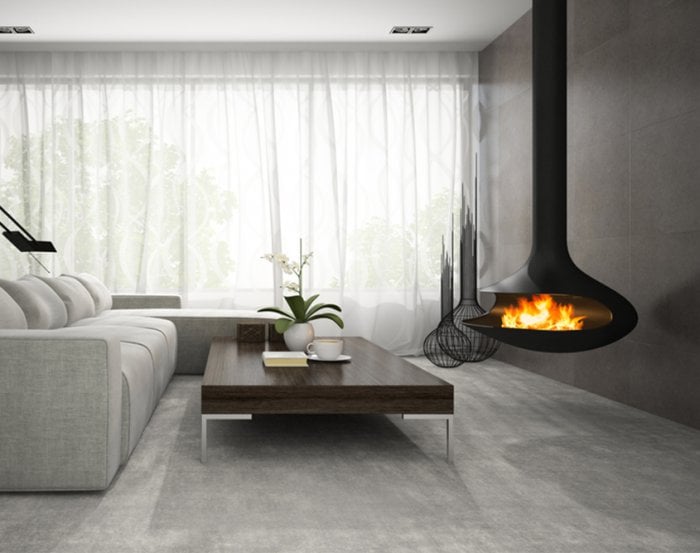 black pod fireplace hanging from ceiling in living room