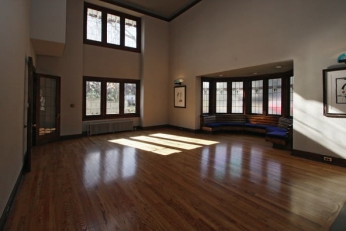 Renowned architect Evans Woollen demolished the second-story bedroom that belonged to Kurt Vonnegut's parents to create this extra tall great room. (Photo courtesy of Matt McLaughlin, F.C. Tucker Company)