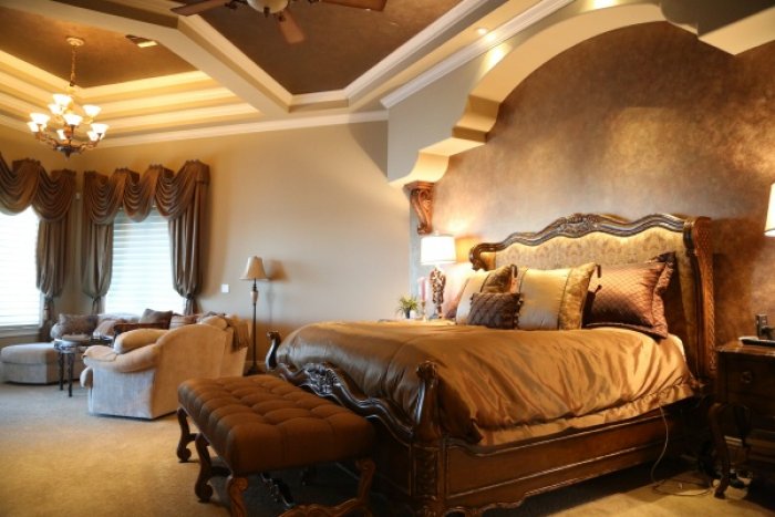 Turn your master bedroom into a master suite by adding a comfortable sitting area. (Photo by Luxury Home Solutions )