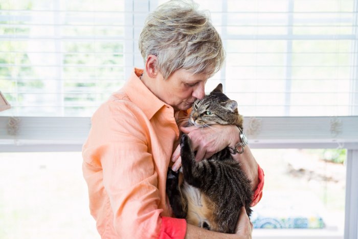 A woman with her cat