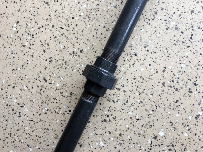 making DIY industrial pipe curtain rod