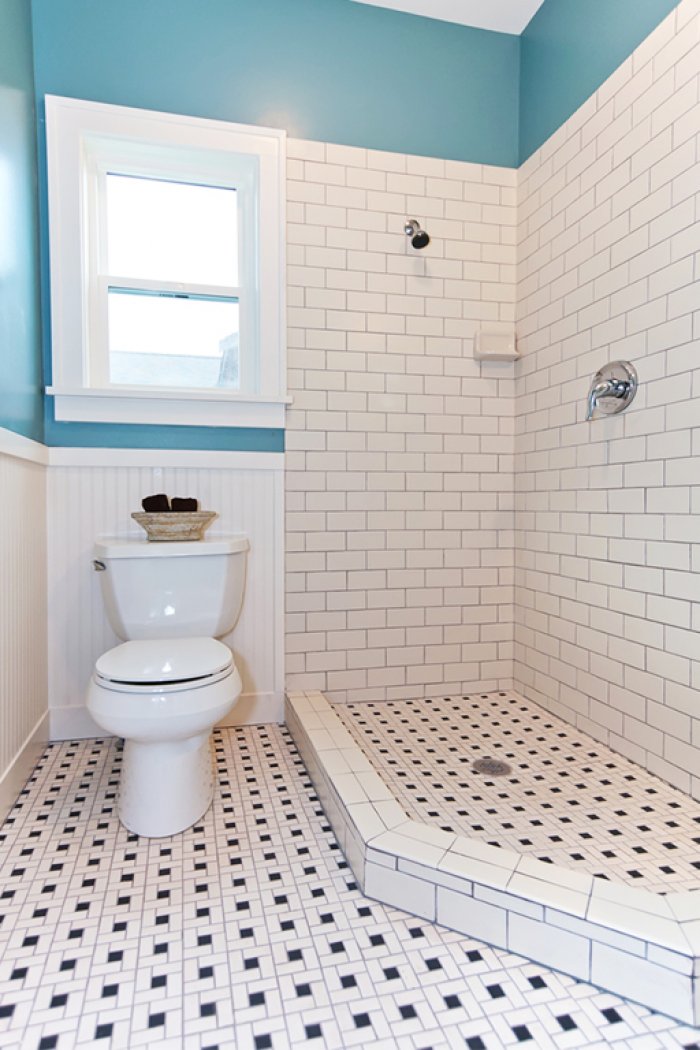 Blue and white bathroom with subway tile
