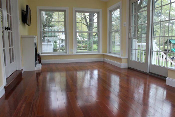 Windows serve an important role in sunrooms, adding to their overall beauty and appeal. You may need energy-efficient or sun-blocking windows to help control your sunroom's temperature. (Photo courtesy of Window & Door Designs)