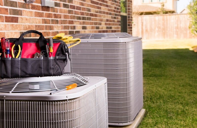 HVAC repair outside of home (Photo by Fstop123/iStock/Getty Images Plus via Getty Images)