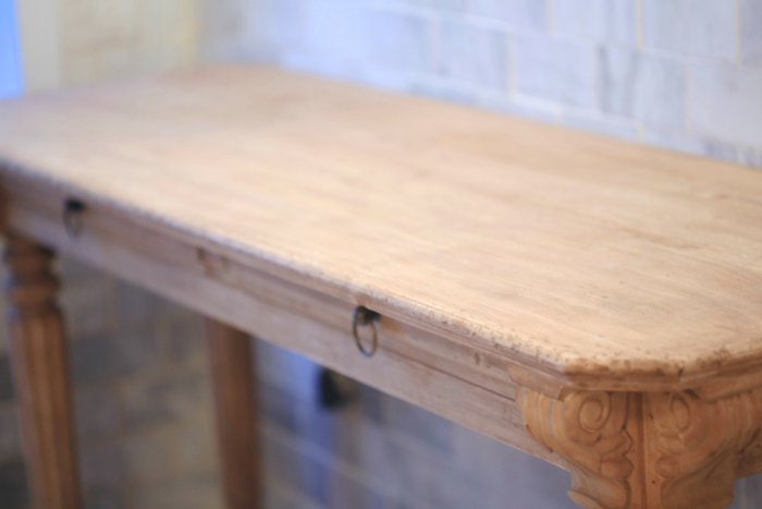 Avoid breaking the bank by building your own vanity from a console. (Photo courtesy of Courtney A/The French Country Cottage)