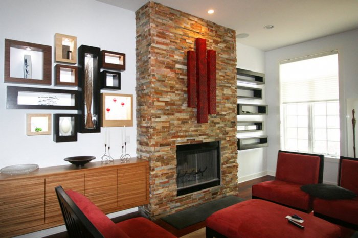 Home using accent lighting to highlight art over a fireplace