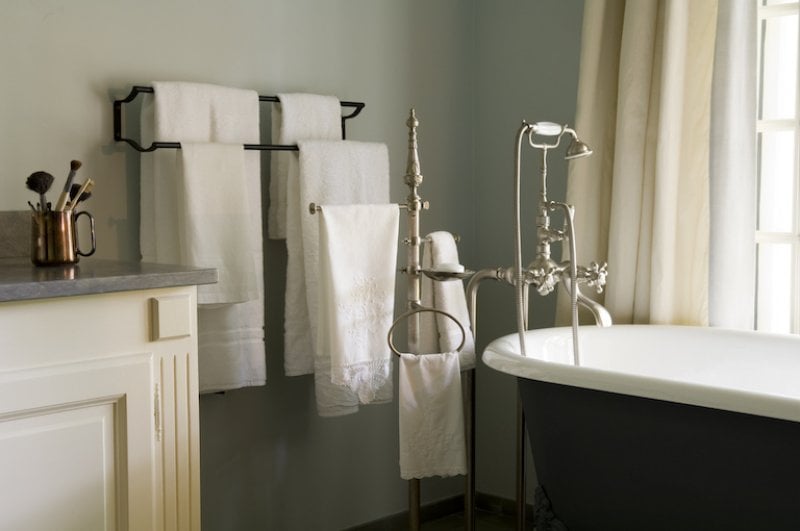 closeup of bathroom with towel racks and freestanding bathrub (Photo by Andreas von Einsiedel/Corbis Documentary via Getty Images)