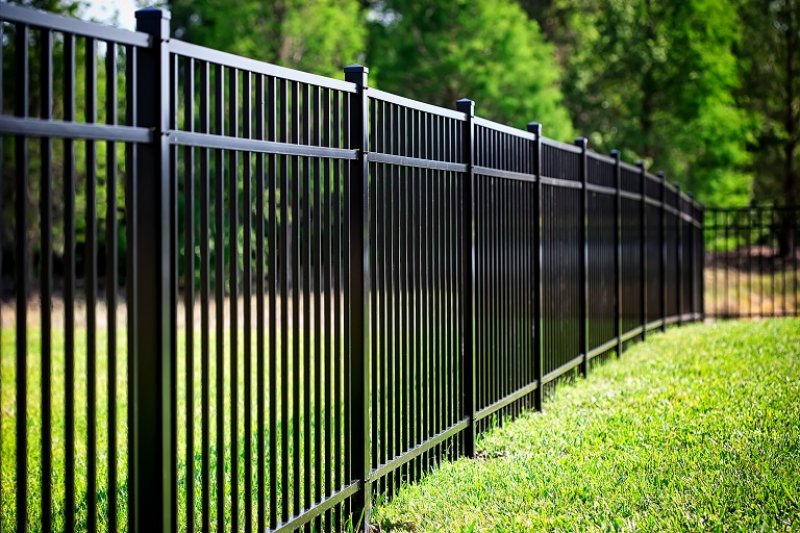 Black Aluminum Fence Black Aluminum Fence (Photo by © genotar1 / Adobe Stock)