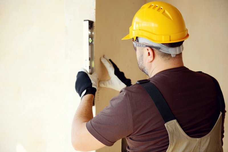 Contractor working on house (Photo by elenaleonova / iStock / Getty Images Plus via Getty Images)