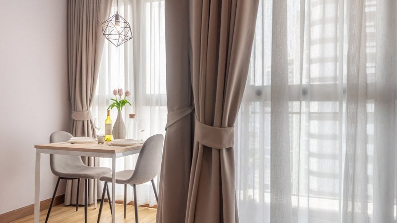 Heavy drapes at windows (Photo by By Jub Rubjob / Moment via Getty Images)