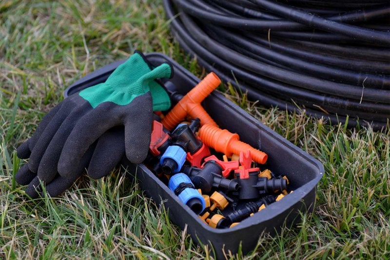 caps and attachments to irrigation system (Photo by Ofresia - stock.adobe.com)
