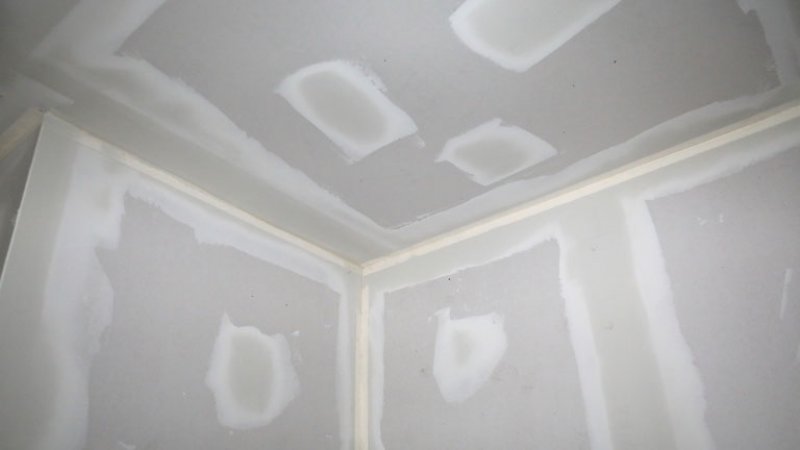 Drywall panels with mud on the joints (Photo by Douglas Sacha / Moment via Getty Images)
