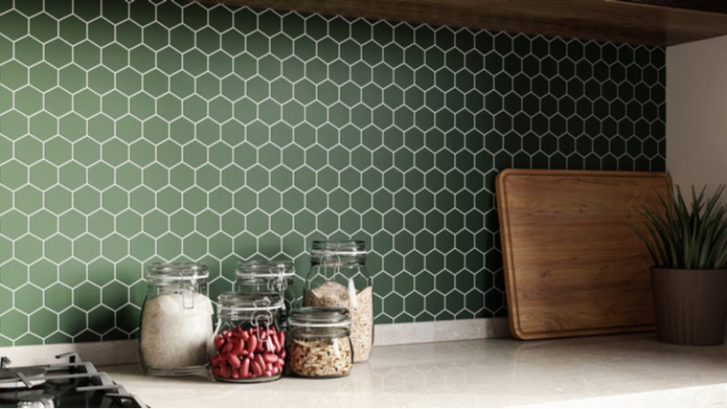 Green hexagon ceramic kitchen backsplash (Photo by IZ1737/Shutterstock.com)
