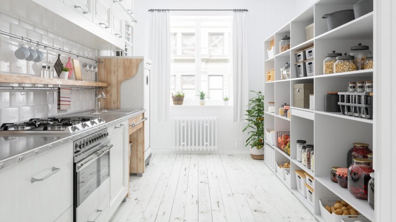 The interior of a bright organized kitchen (Photo by onurdongel/E+ via Getty Images)