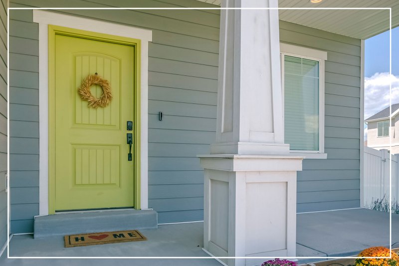 lime color painted front door (Photo by Jason Finn/iStock/Getty Images Plus via Getty Images)