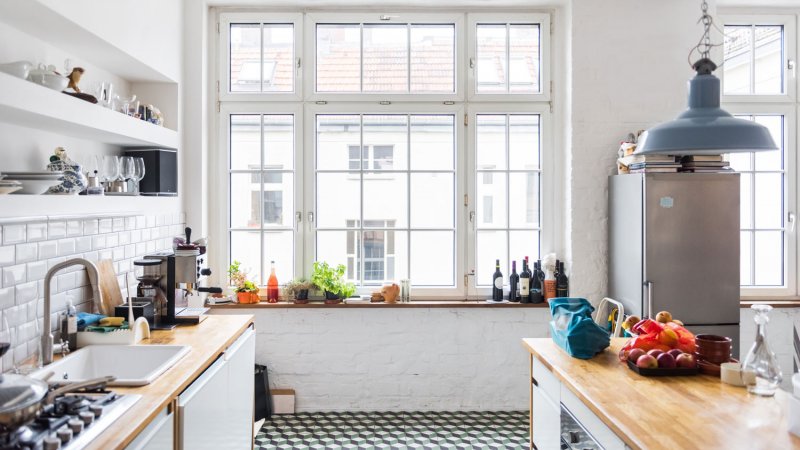 A bright kitchen in a loft apartment (Photo by Hinterhaus Productions/DigitalVision via Getty Images)