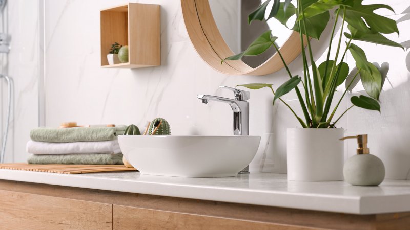 Close-up of a modern bathroom faucet (Photo by New Africa - stock.adobe.com)