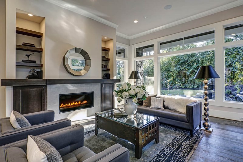 Modern living room with gas fireplace Modern living room with gas fireplace (Photo by irina88w/iStock/Getty Images Plus/Getty Images)