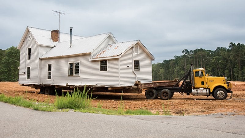 Transporting a house by truck Transporting a house by truck (Photo by Becky Wright - stock.adobe.com)