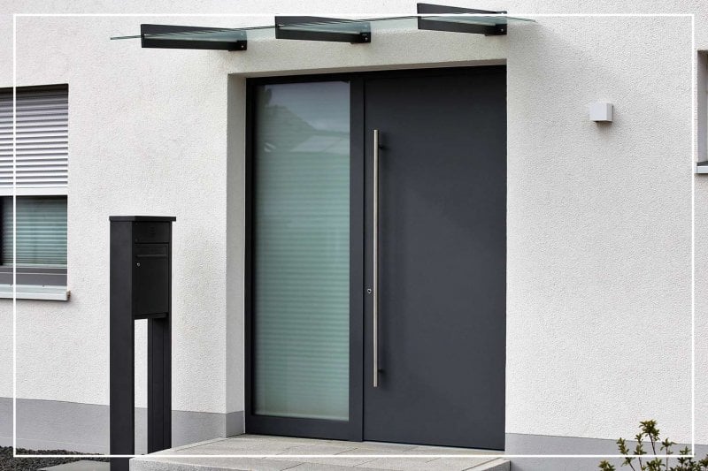 off-black color front door (Photo by Palatinate Stock/Shutterstock.com)