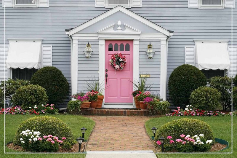 pastel pink-painted front door (Photo by Joy Brown/Shutterstock.com)