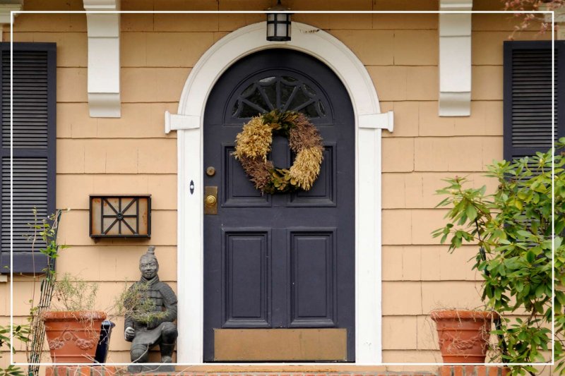 plum color front door (Photo by SondraP/iStock/Getty Images Plus via Getty Images)