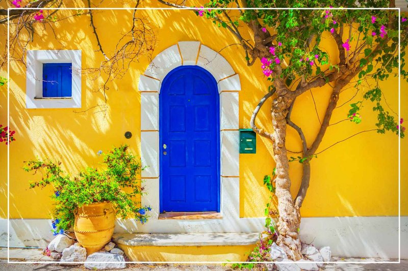 saturated blue color front door (Photo by Adisa/iStock/Getty Images Plus via Getty Images)